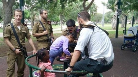 IDF soldiers babysit for illegal alien child